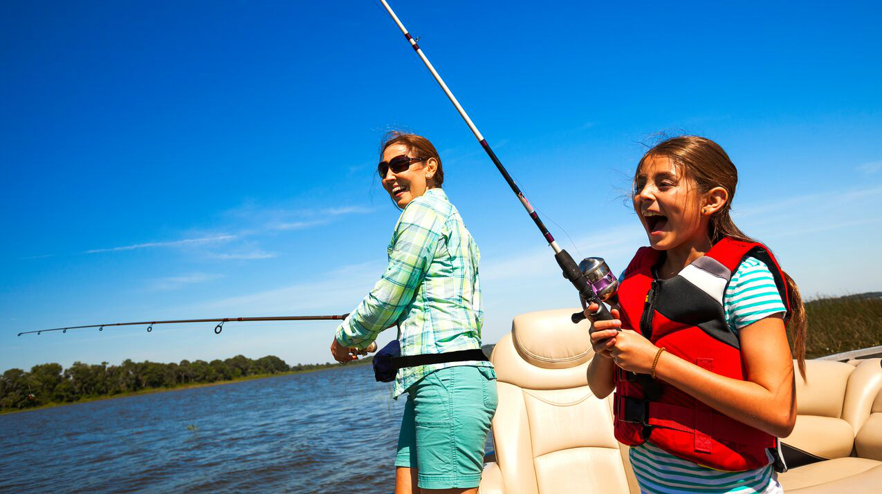 Mother and daughter fishing