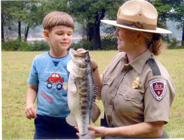 boy and ranger with fish