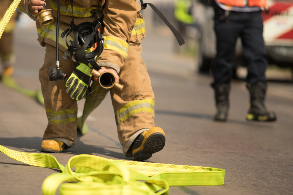 firefighter holding hose