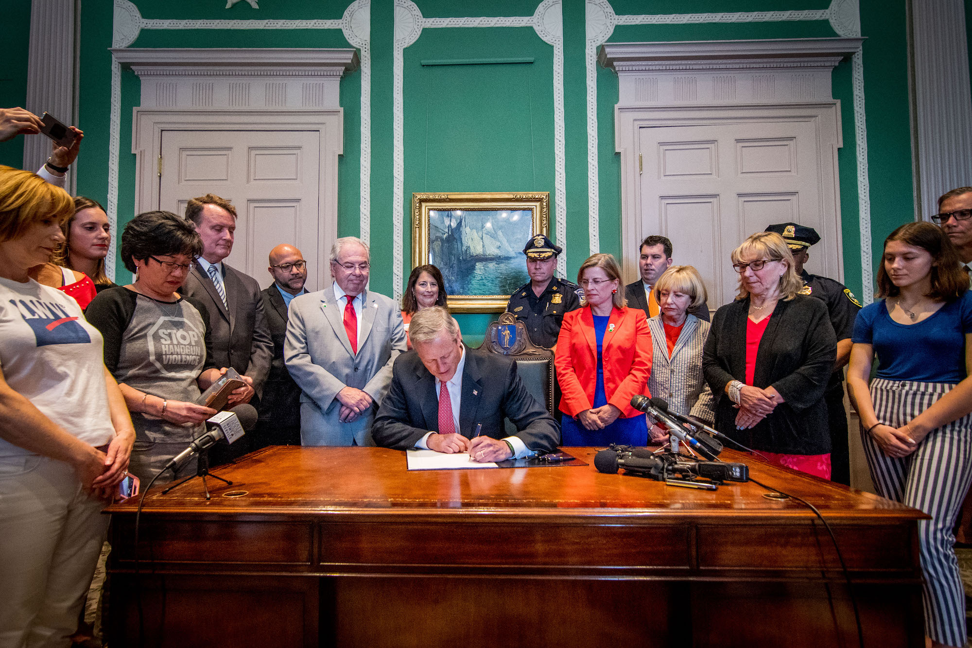 Governor Baker signs the ERPO bill into law.