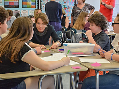 AG Healey speaks with students