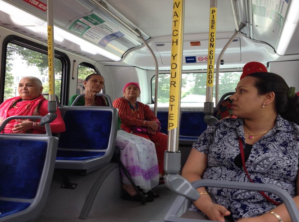 Bhutanese seniors riding a bus
