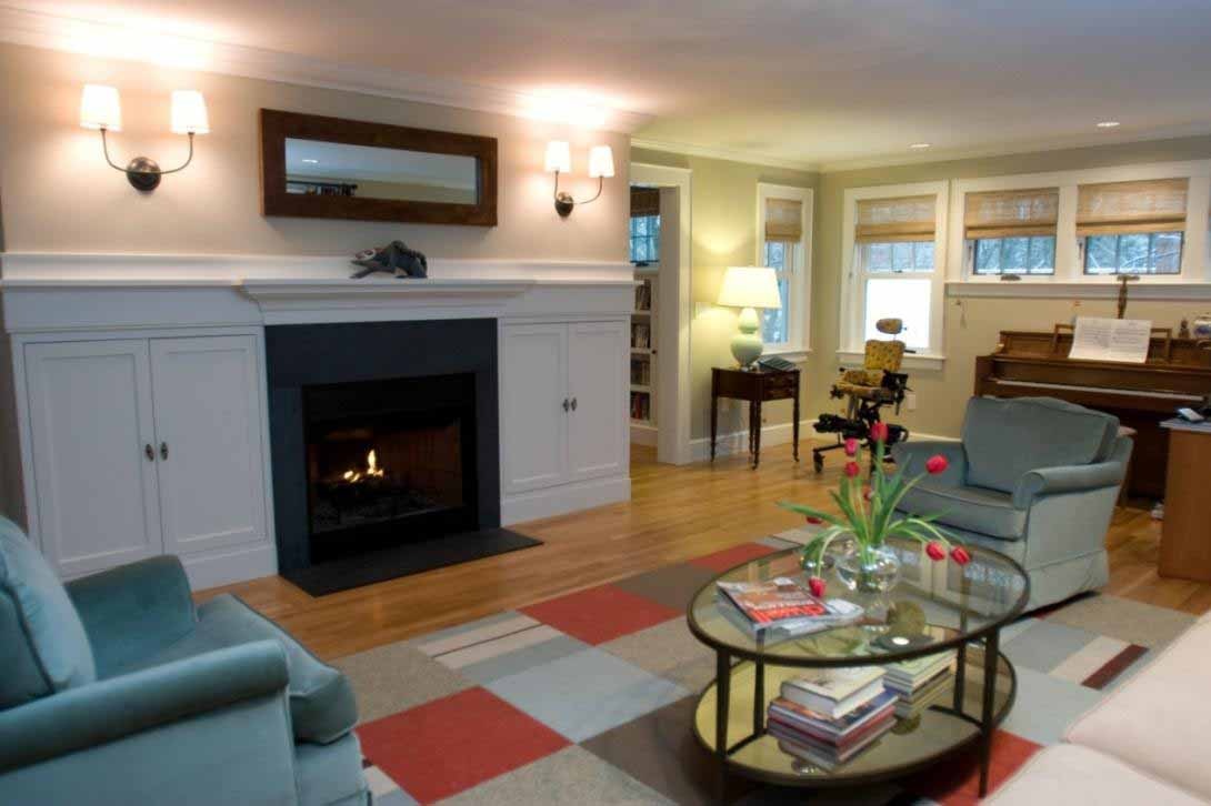 Interior view of a living room space centered around a fireplace
