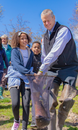 Governor Baker, State Environmental Officials, Local Youth Stock Trout at Boston’s Jamaica Pond