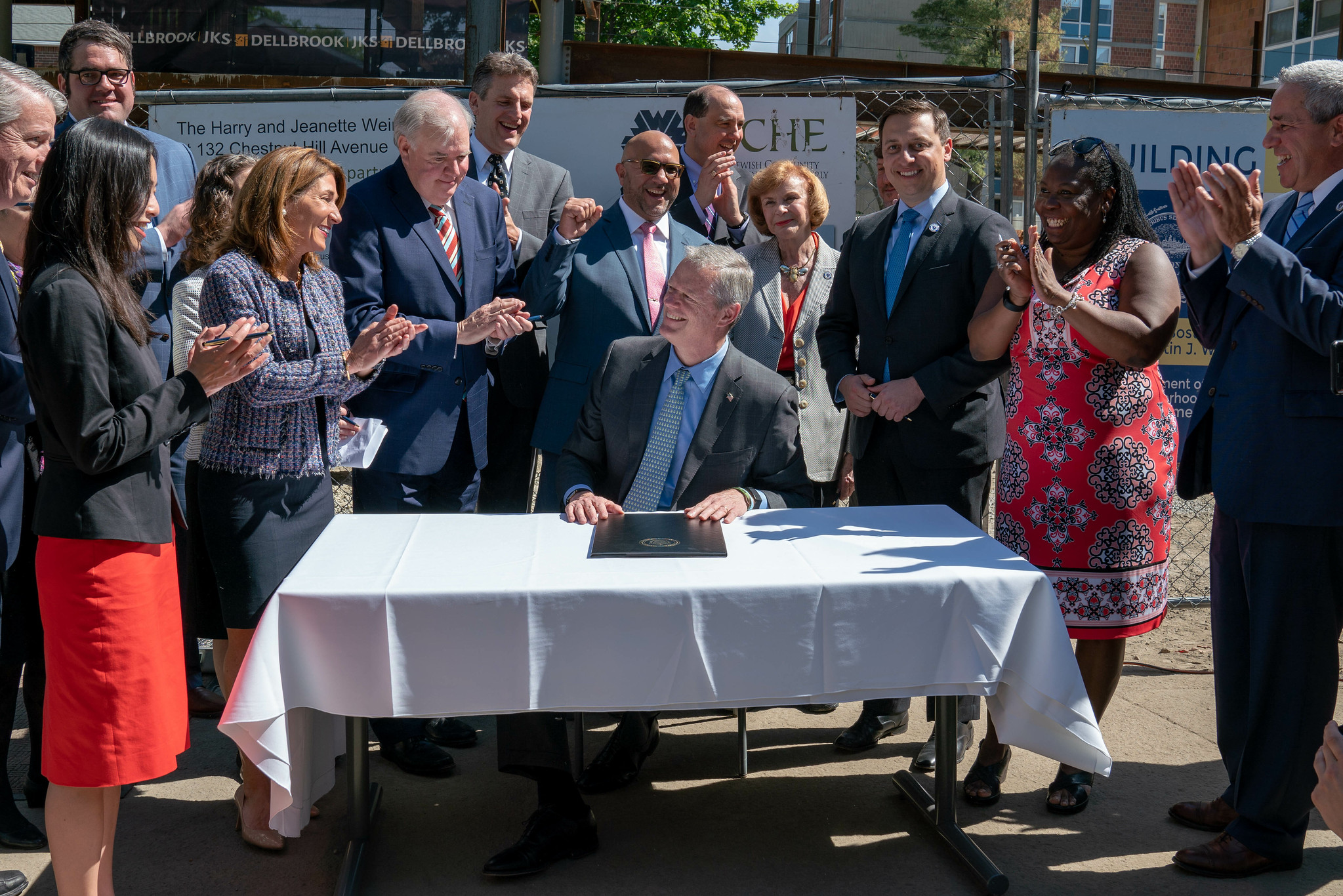 Governor Baker signing the largest housing bond bill in Massachusetts history into law.