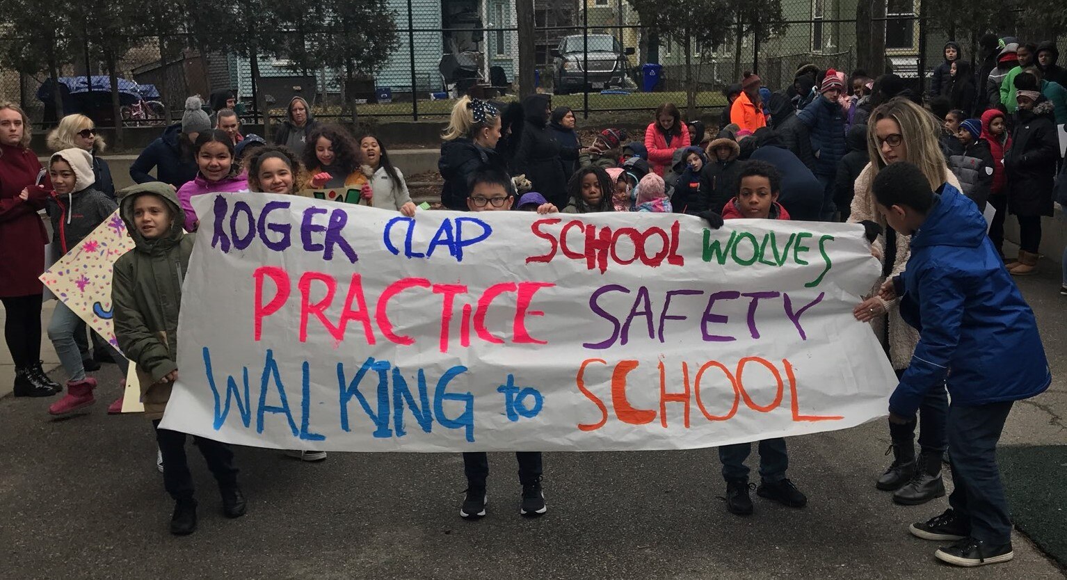 image of children holding Walk to school banner