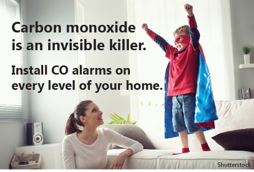 Mother and son playing with the text, "Carbon monoxide is an invisible killer. Install CO alarms on every level of your home. 