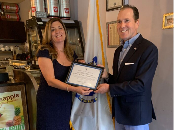 Licensee Mary Jane “MJ” Taglieri owner of Options Real Estate Services, LLC of Marblehead was awarded a certificate of acknowledgement by Undersecretary Edward A. Palleschi.