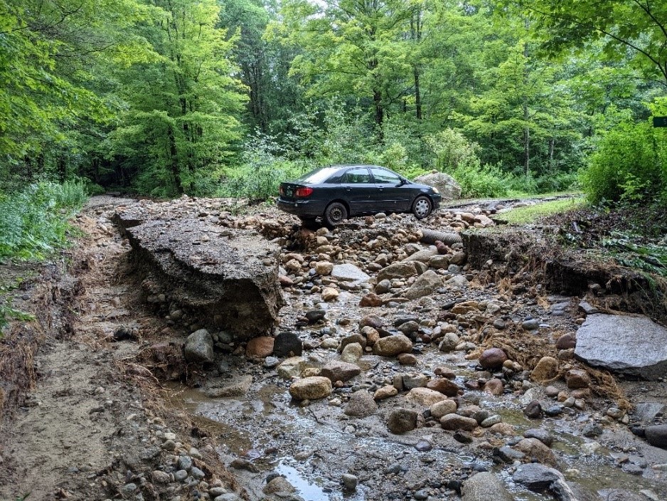 Damage to Chestnut Hill Road in Warwick (Franklin County) from a storm in July 2021. (Photo courtesy of Brian Snell, Warwick Selectboard member)