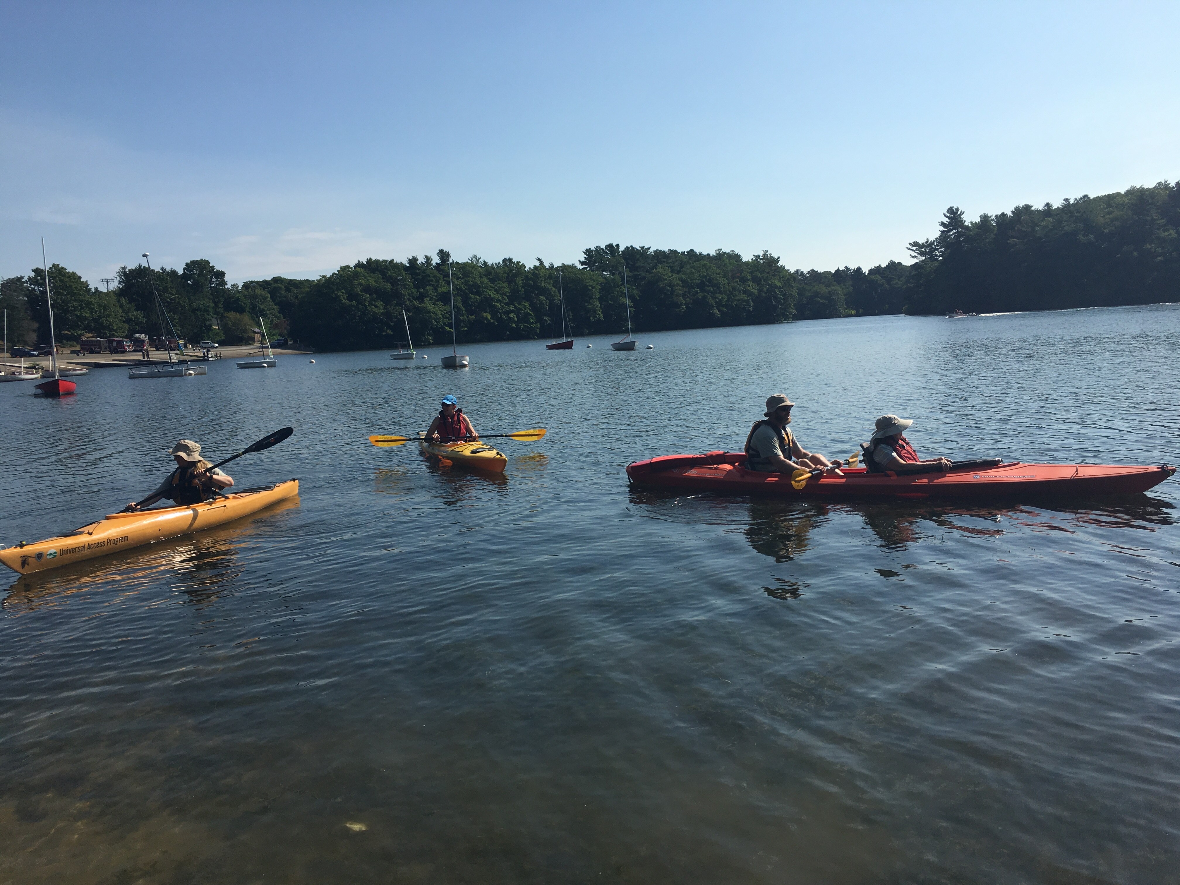 A group of paddlers on Lake Cochituate 