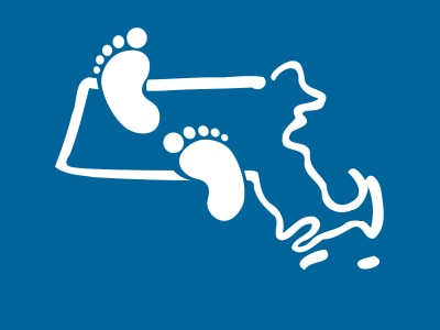 An illustration of Massachusetts with baby footprints on top in front of a blue background.