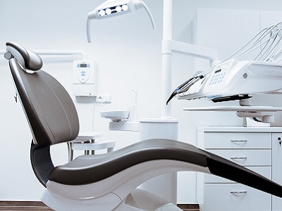 A dental chair in a dental office for patients to lie down for their dental works.
