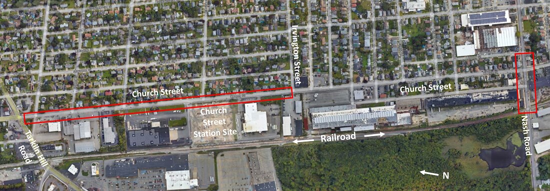 Overhead view of project site showing the location of Church Street and the railroad, which run parallel, and other landmarks. 