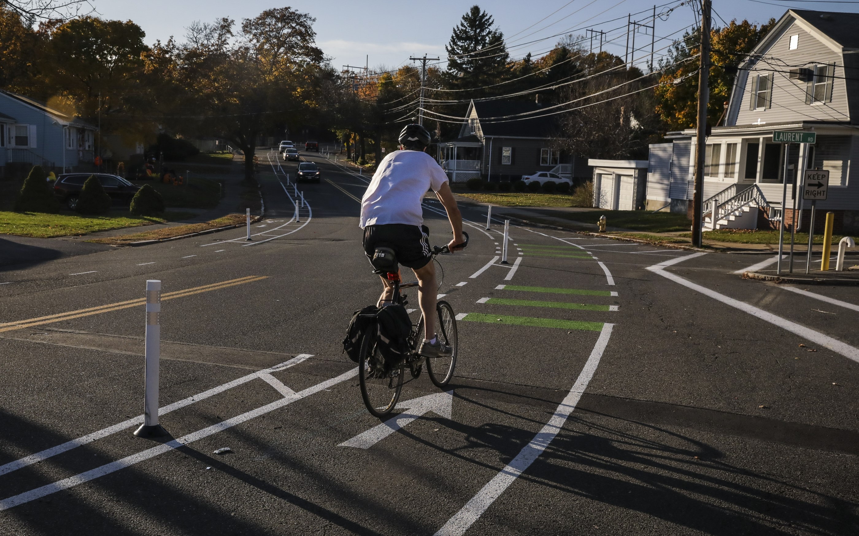After photo example for Willson St. in Salem - shows bicyclist riding along a separated bike lane