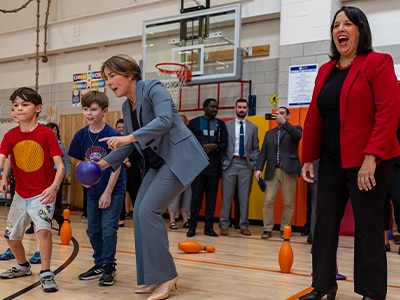 Governor Healey and LG Driscoll playing with students