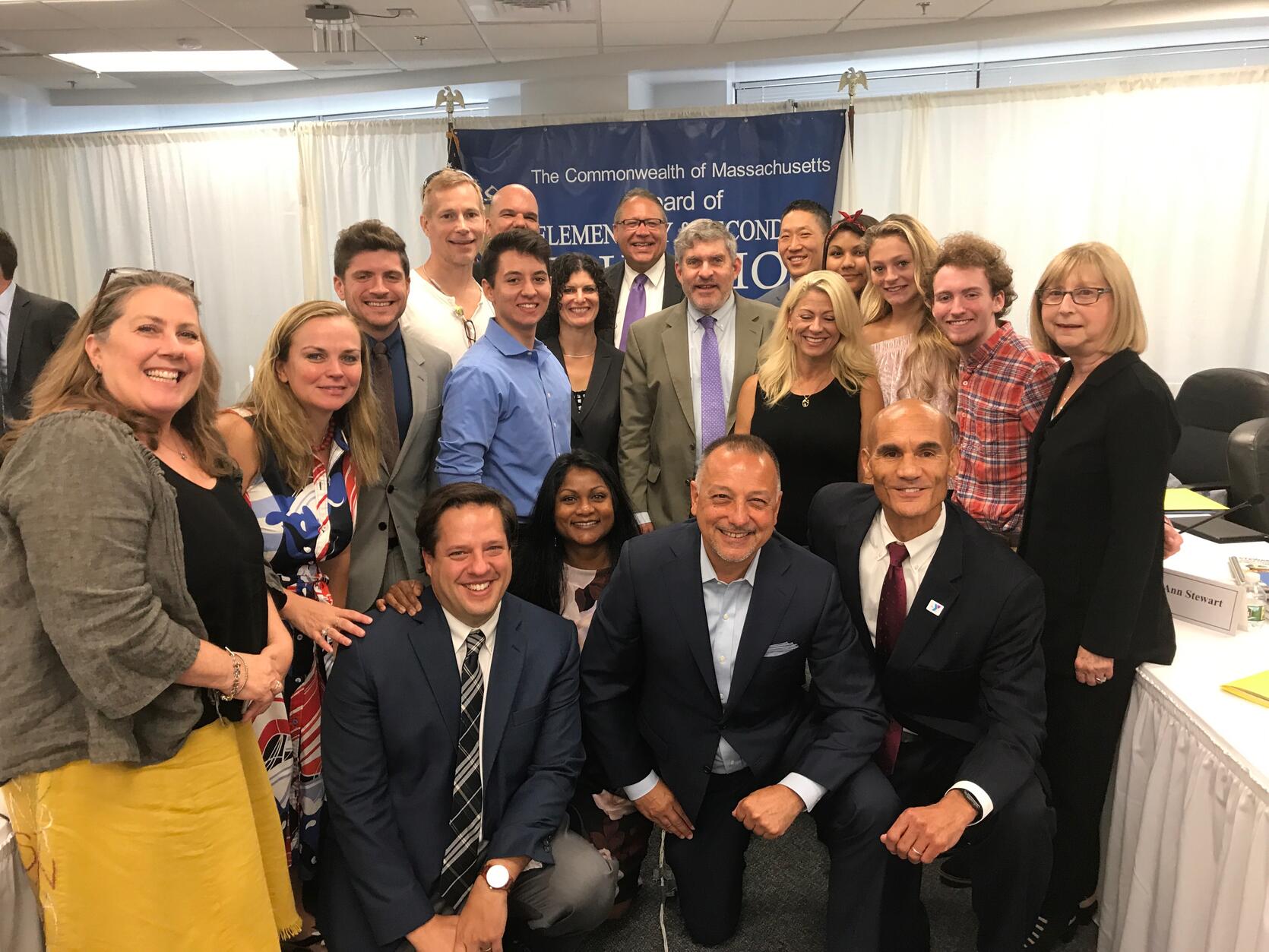 Commissioner Wulfson, members of the Board, and affiliates of the Commission on LGBTQ Youth pose after the Safe Schools presentation.