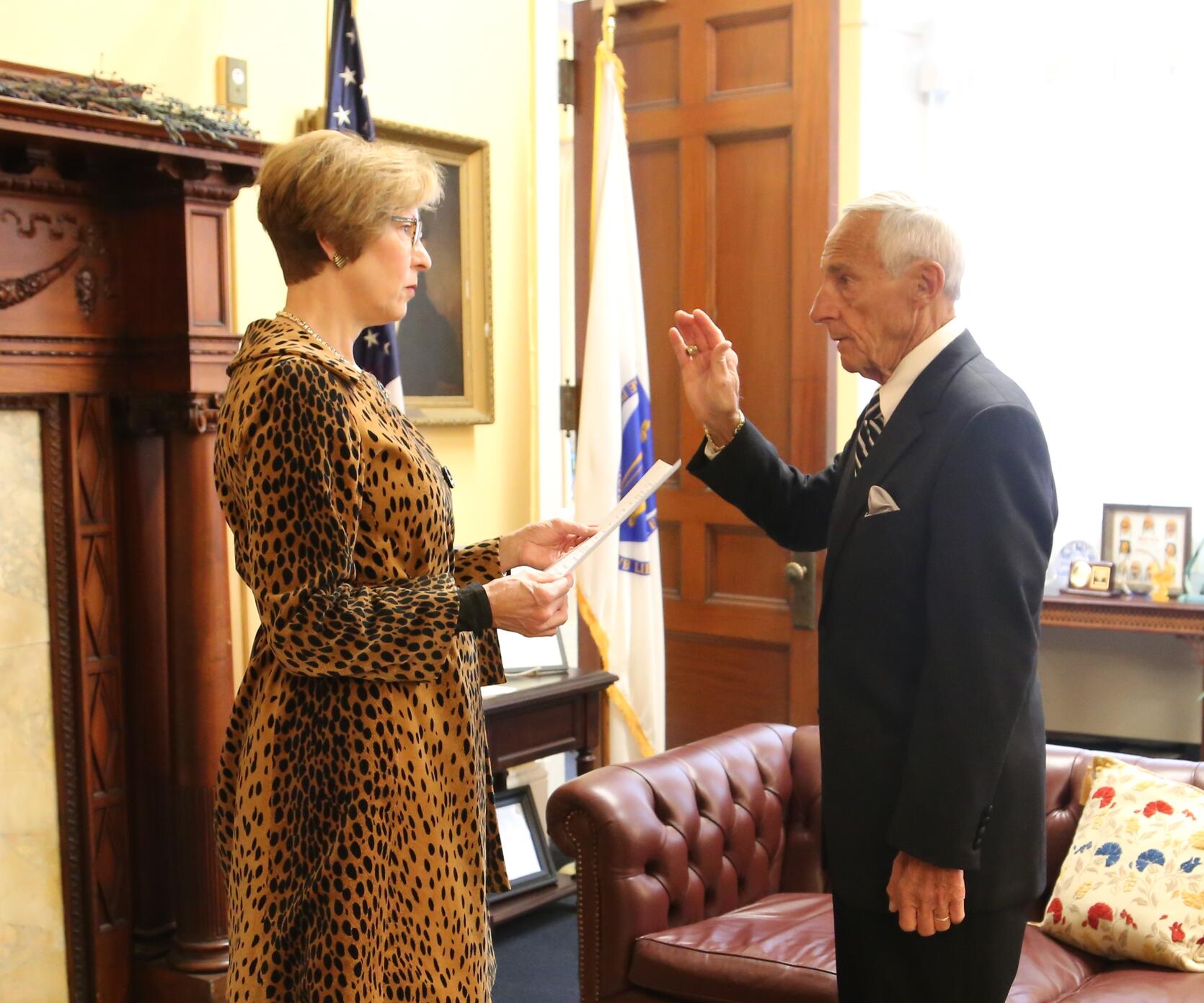 Auditor Bump administers the oath of office to here Inspector General Council appointee George DiTomassi, Jr. at the State House