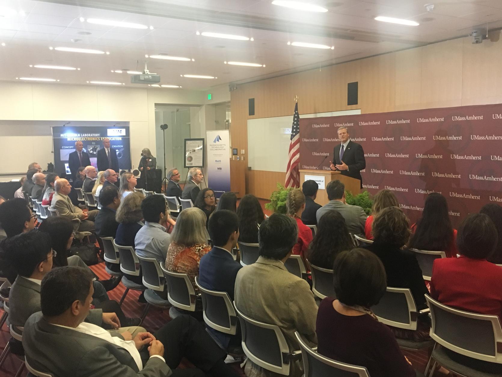 Governor Baker speaking during grant announcement at UMass Amherst.