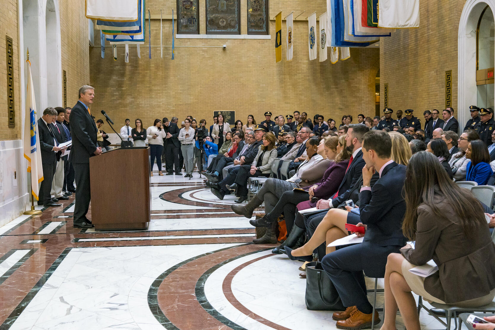 Governor Baker announcing grant awards to combat gang violence in Massachusetts cities.
