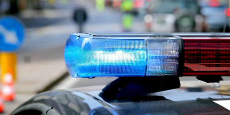 police car with blue red sirens, blue light lit