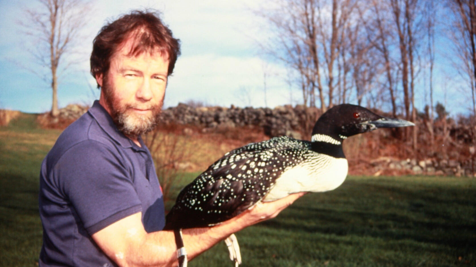 MassWildlife Photographer Bill Byrne with a loon