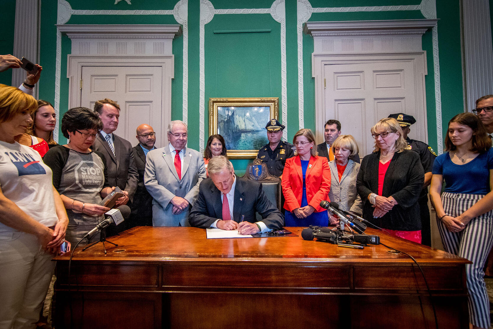 Governor Baker signs the ERPO bill into law.