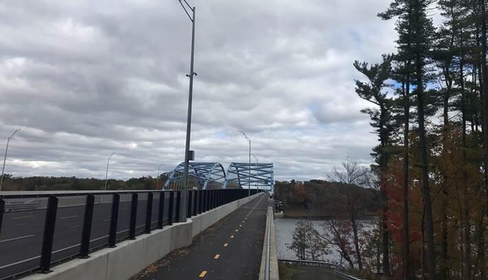 A photograph of the new Whittier Bridge which carries vehicles, bicycles, and pedestrians over the Merrimack River between Newburyport and Amesbury.