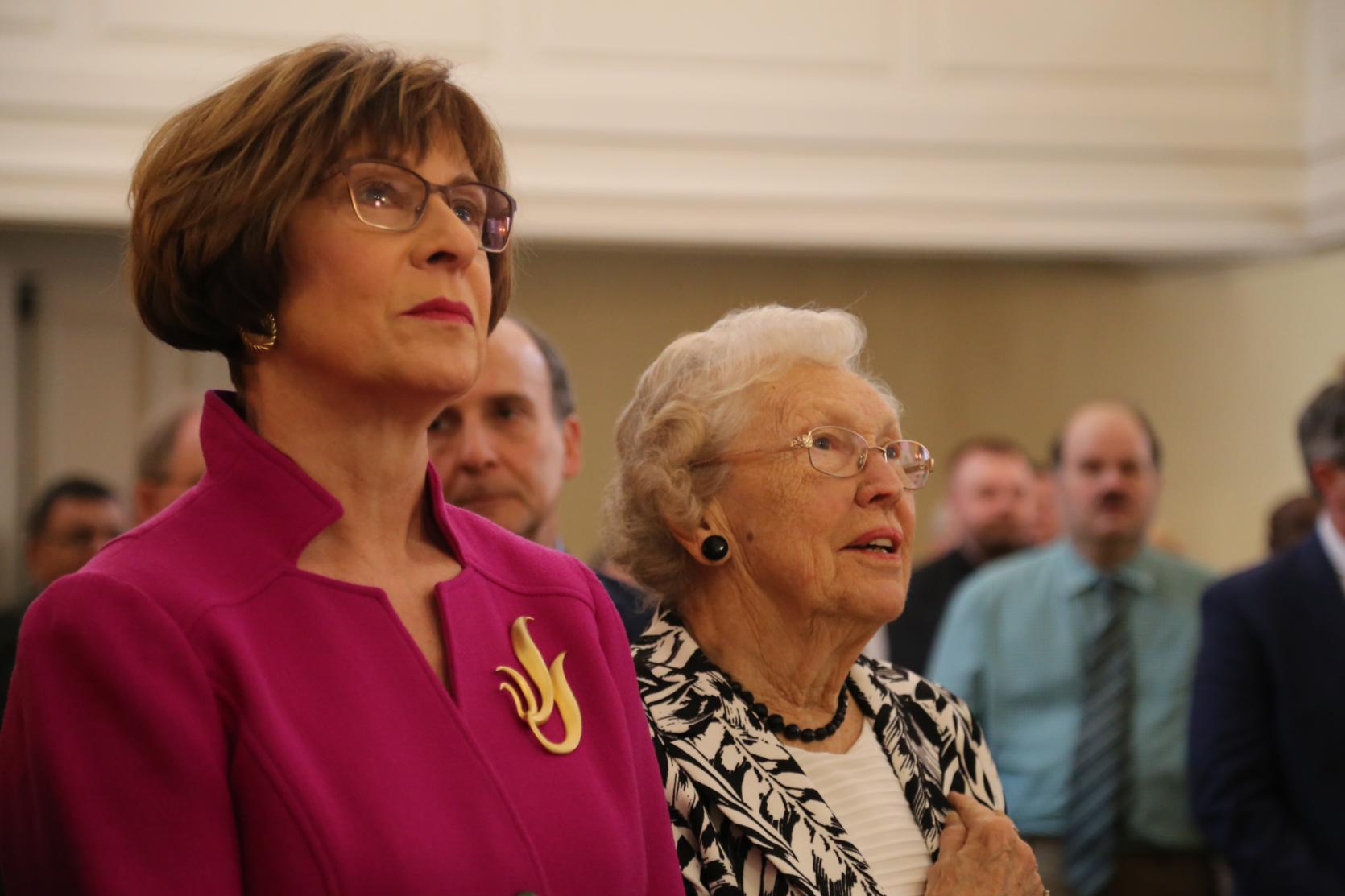 Auditor Bump standing next to her mother at her inaugural ceremony. 