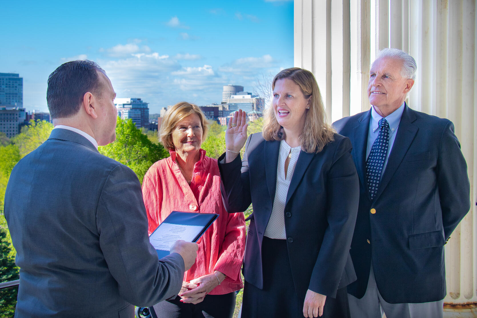 Edward A. Palleschi swears in Mary Gallagher as the new Commissioner at the Division of Banks (DOB).
