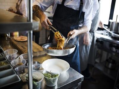 head cook cooking in a correctional facility