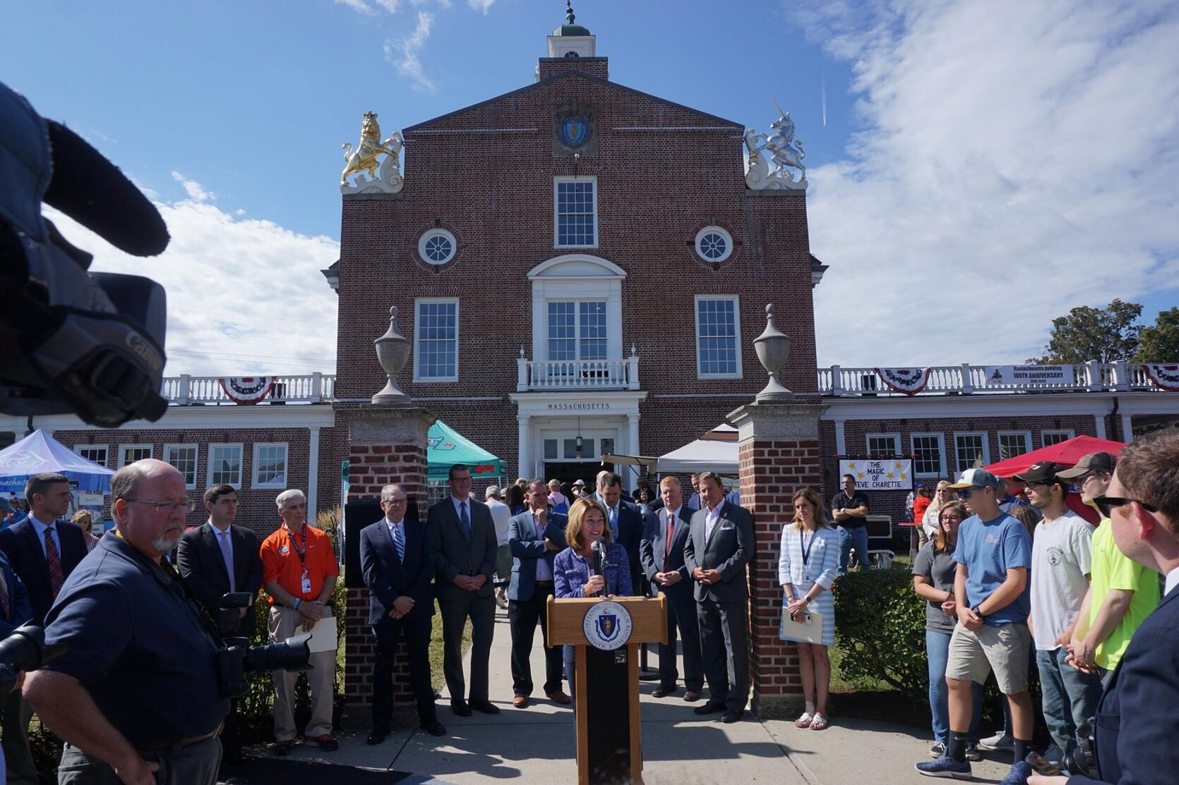 Lieutenant Governor Karyn Polito offers remarks at a rededication ceremony celebrating the 100th anniversary of the Massachusetts State Exposition Building at the Big E.
