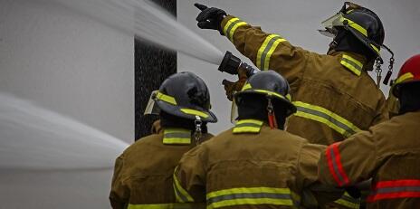 Fire chief directing firefighters