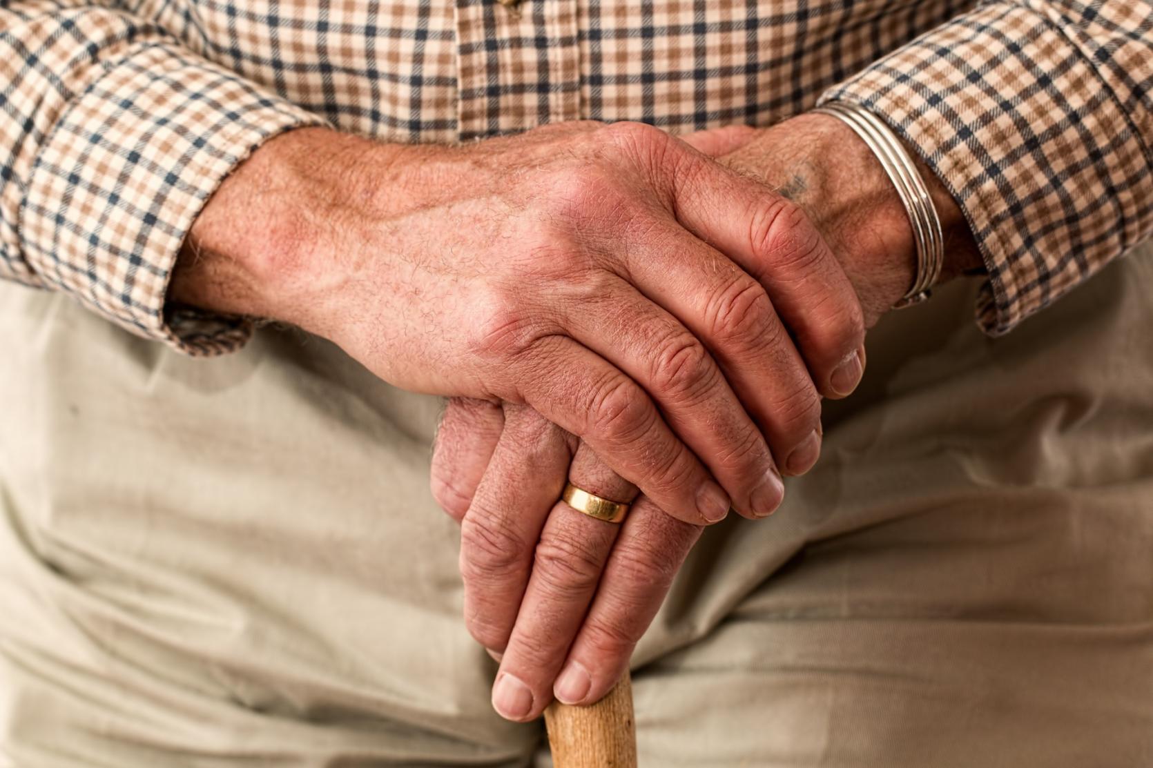 An image of an elderly man's hands.