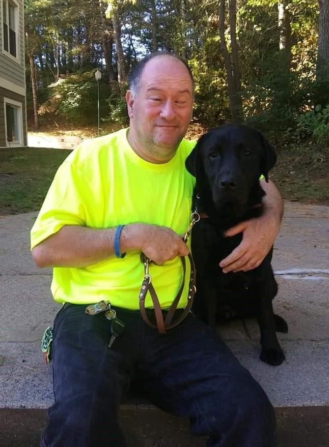 MCB Consumer Peter Akusis and Guide Dog Ryker enjoy the outdoors together