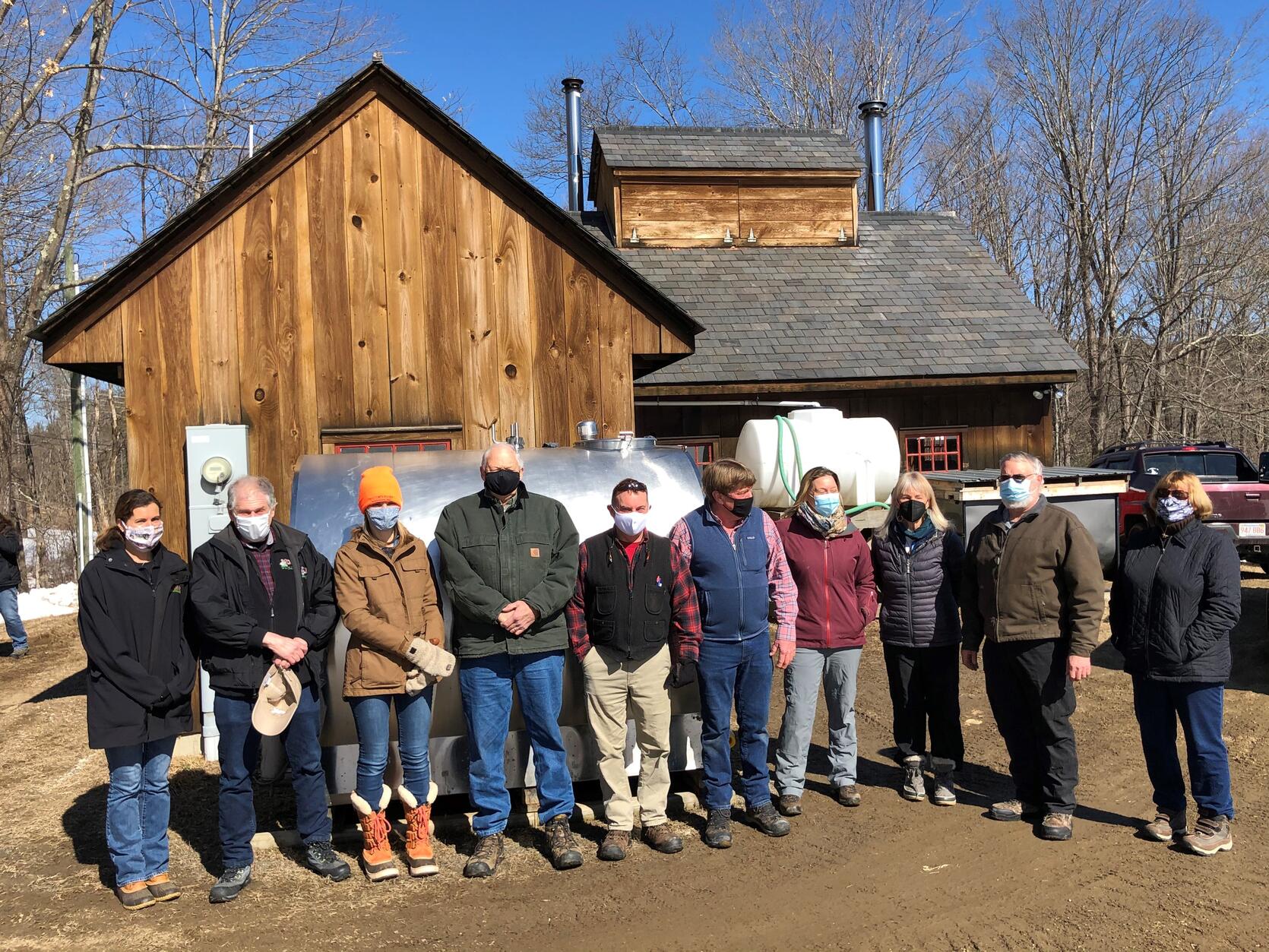 Energy and Environmental Affairs Secretary Kathleen Theoharides and Department of Agricultural Resources Commissioner John Lebeaux visit Stonegate Farm Sugarhouse in Conway.