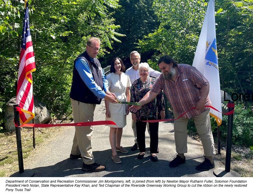 Department of Conservation and Recreation Commissioner Jim Montgomery, left, is joined (from left) by Newton Mayor Ruthann Fuller, Solomon Foundation President Herb Nolan, State Representative Kay Khan, and Ted Chapman of the Riverside Greenway Working Group to cut the ribbon on the newly restored Pony Truss Trail