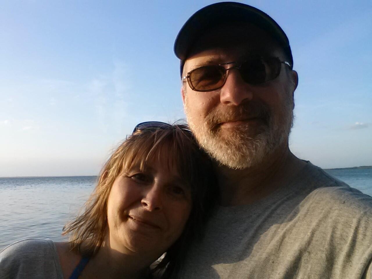 Massachusetts Commission for the Blind staff person Bill Hersh, Adaptive Technology Specialist and Certified Low Vision Therapist, pictured with family on the shore 