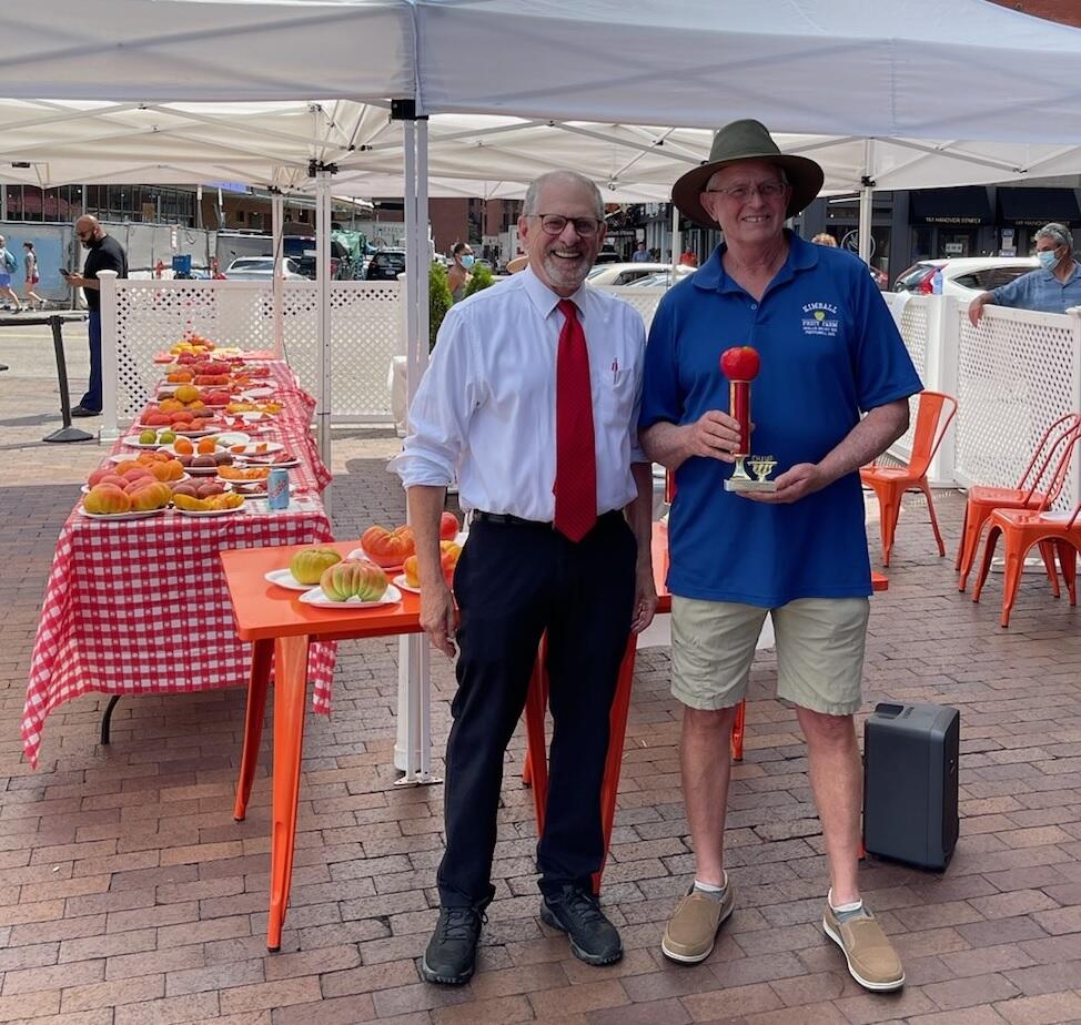MDAR Commissioner Lebeaux with Kimball Fruit Farms, who placed 1st place for heaviest tomato at the 2021 Massachusetts Tomato Contest.