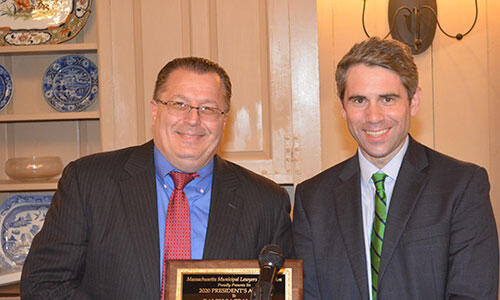 A photo of Ralph Sacramone receiving an award