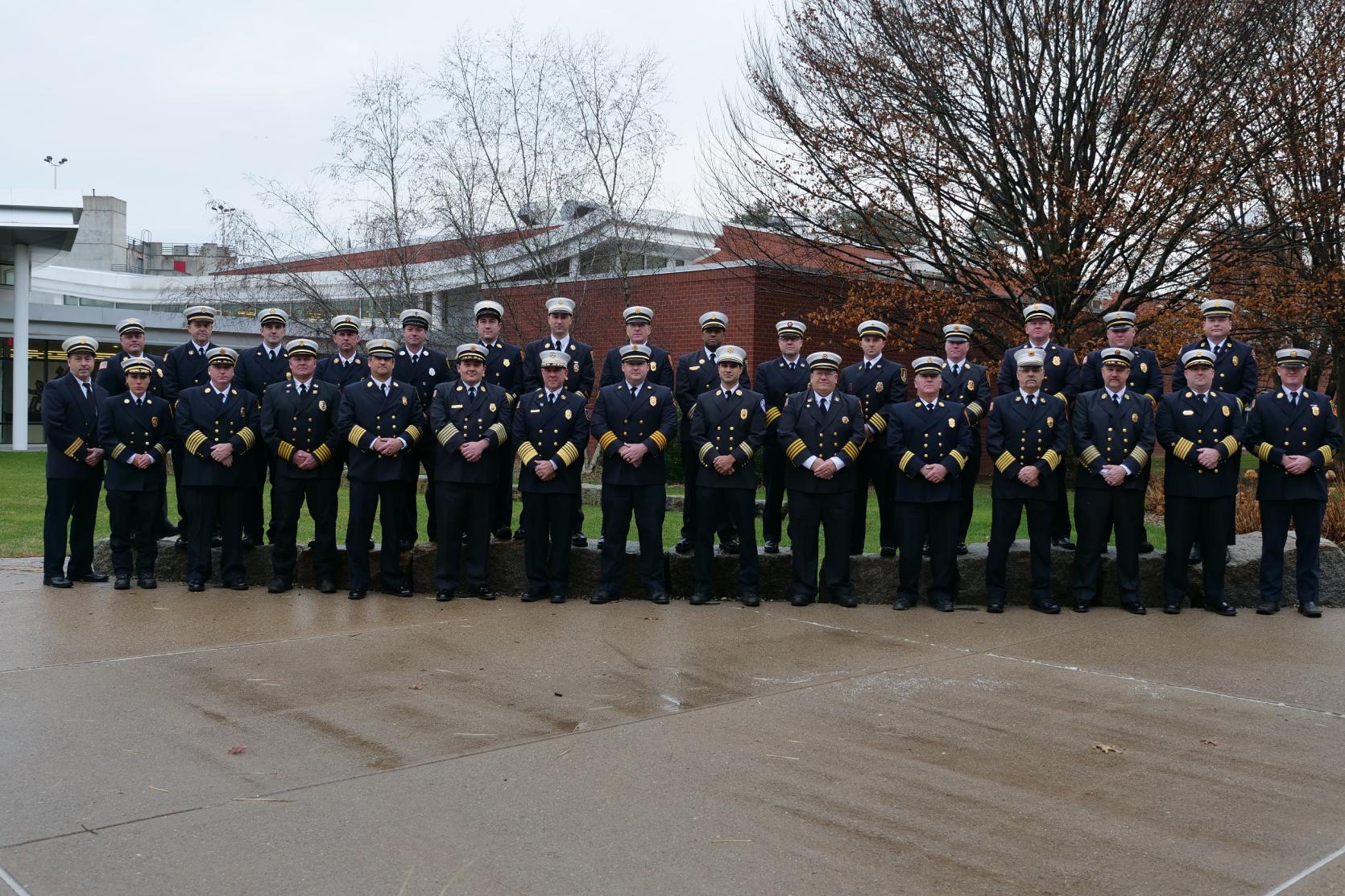 A group of fire chiefs in dress uniforms