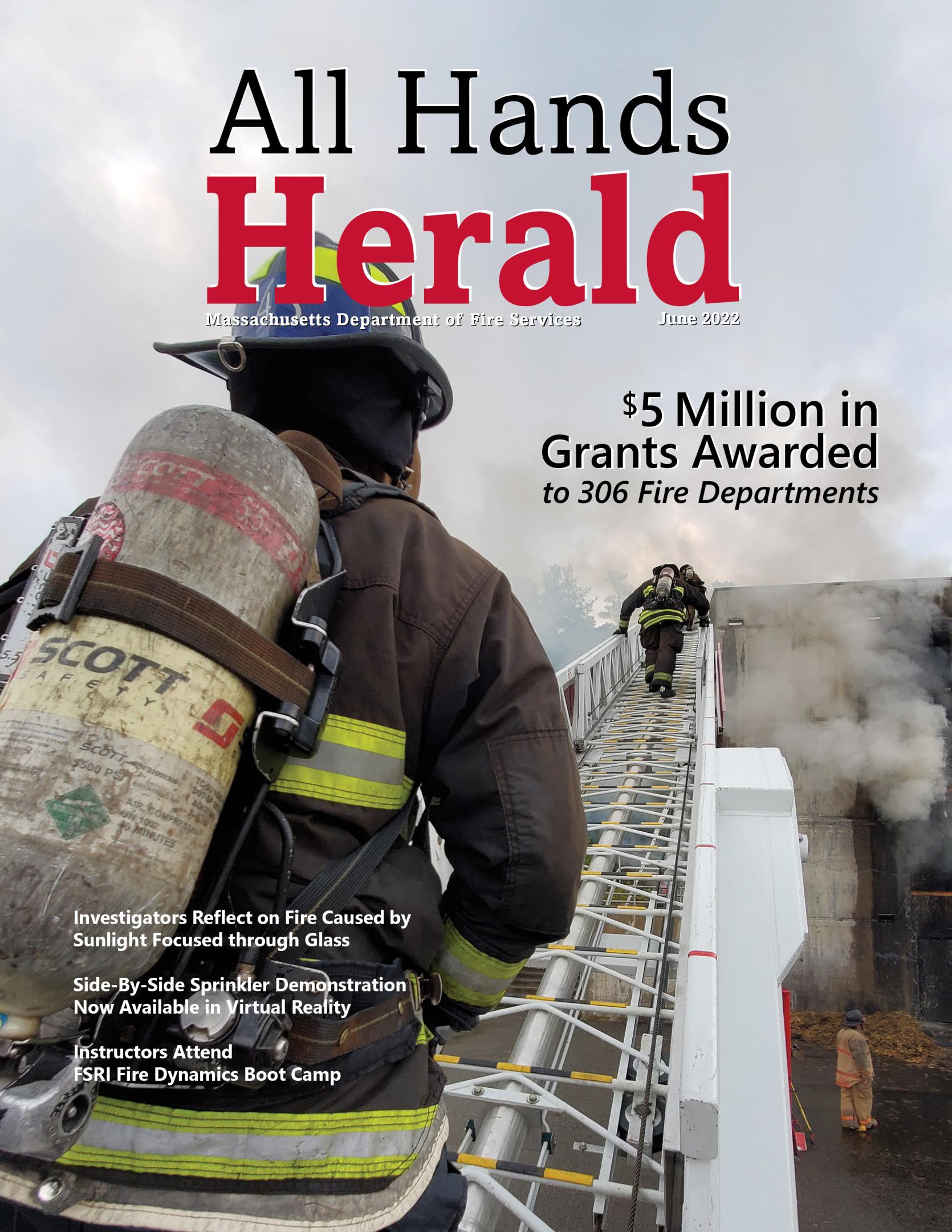 Cover of the June 2022 All Hands Herald. Three firefighters climbing a ladder to extinguish a fire.