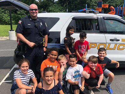 Waltham Police oficer with kids