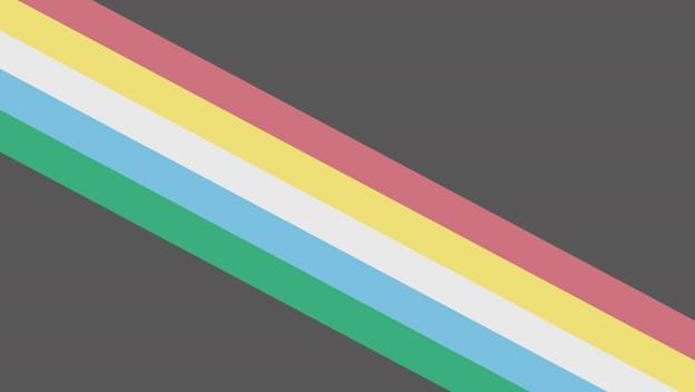 The disability pride flag. Five colorful parallel stripes in the middle of the flag go from the top left to the bottom right corner. From order of top to bottom, the stripes are red, yellow, white, blue, and green. On either side of the stripes is a gray background.