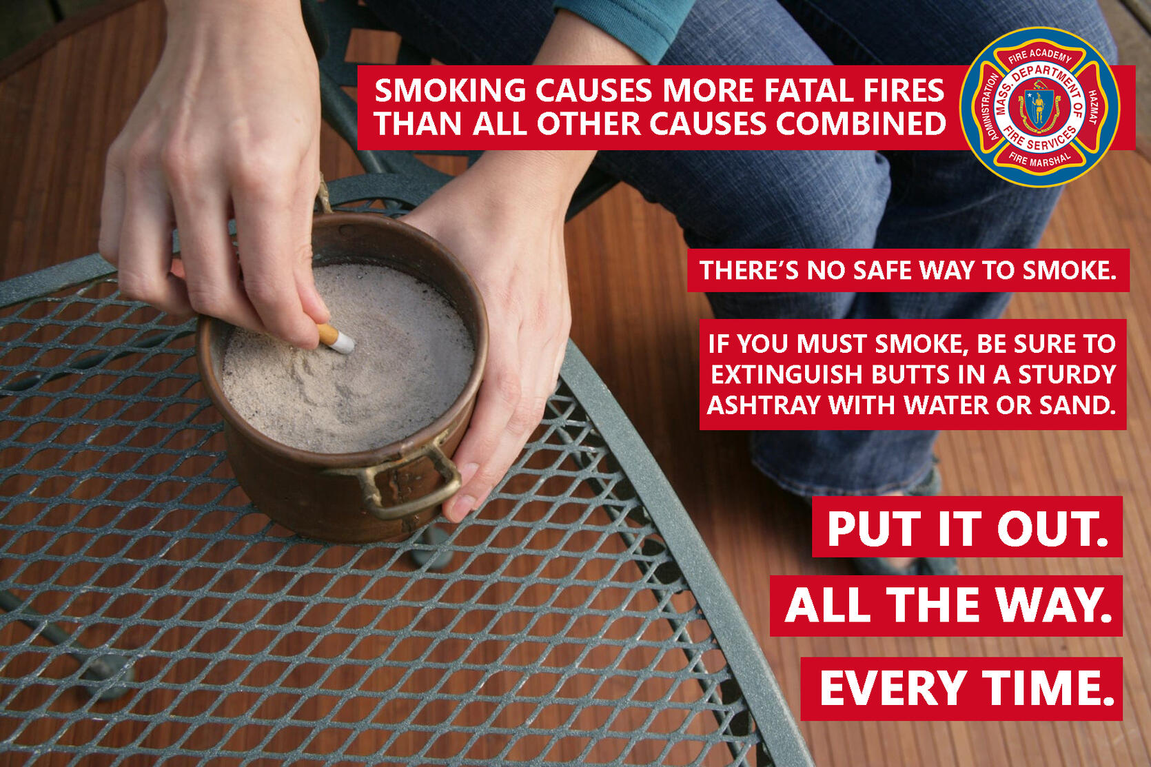 Picture of someone putting out a cigarette in an ashtray