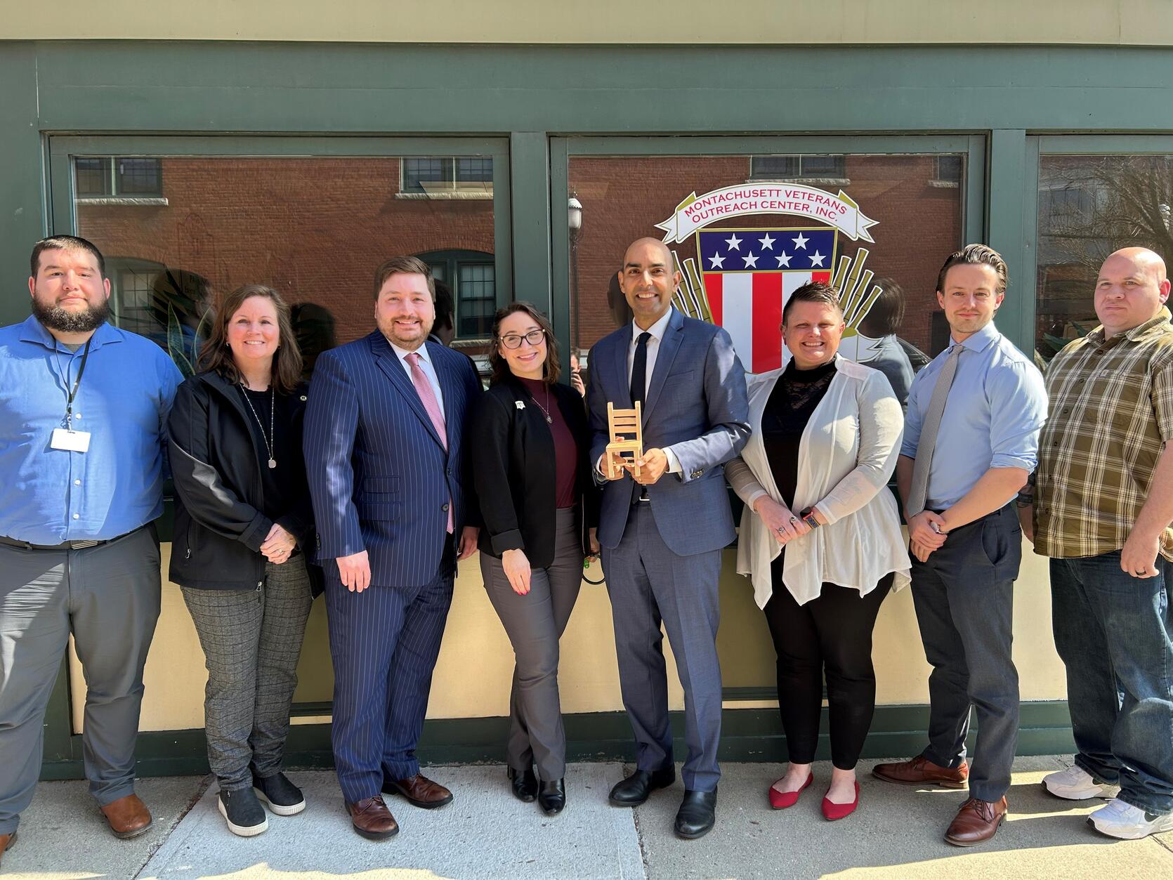 Secretary Santiago pictured with Montachusett Veterans' Outreach Center staff during his recent visit