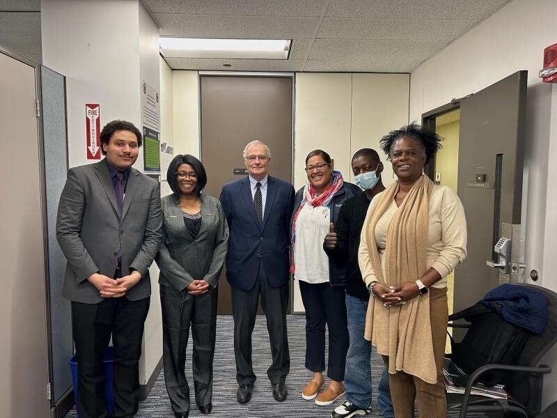 Pictured left to right: Prophetic Resistance members Minister Alan Tanner of St. Luke's AME Church, Attorney Aderonke Lipede, Commissioner Edward Dolan, State Representative Chynah Tyler, Robert Wayne of Lawson Barbershop, and Prophetic Resistance director Danielle Williams