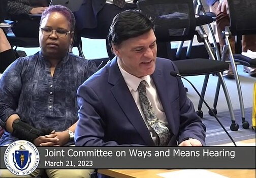 Deputy Commissioner John Oliveira testifying before Joint Committee on Ways and Means