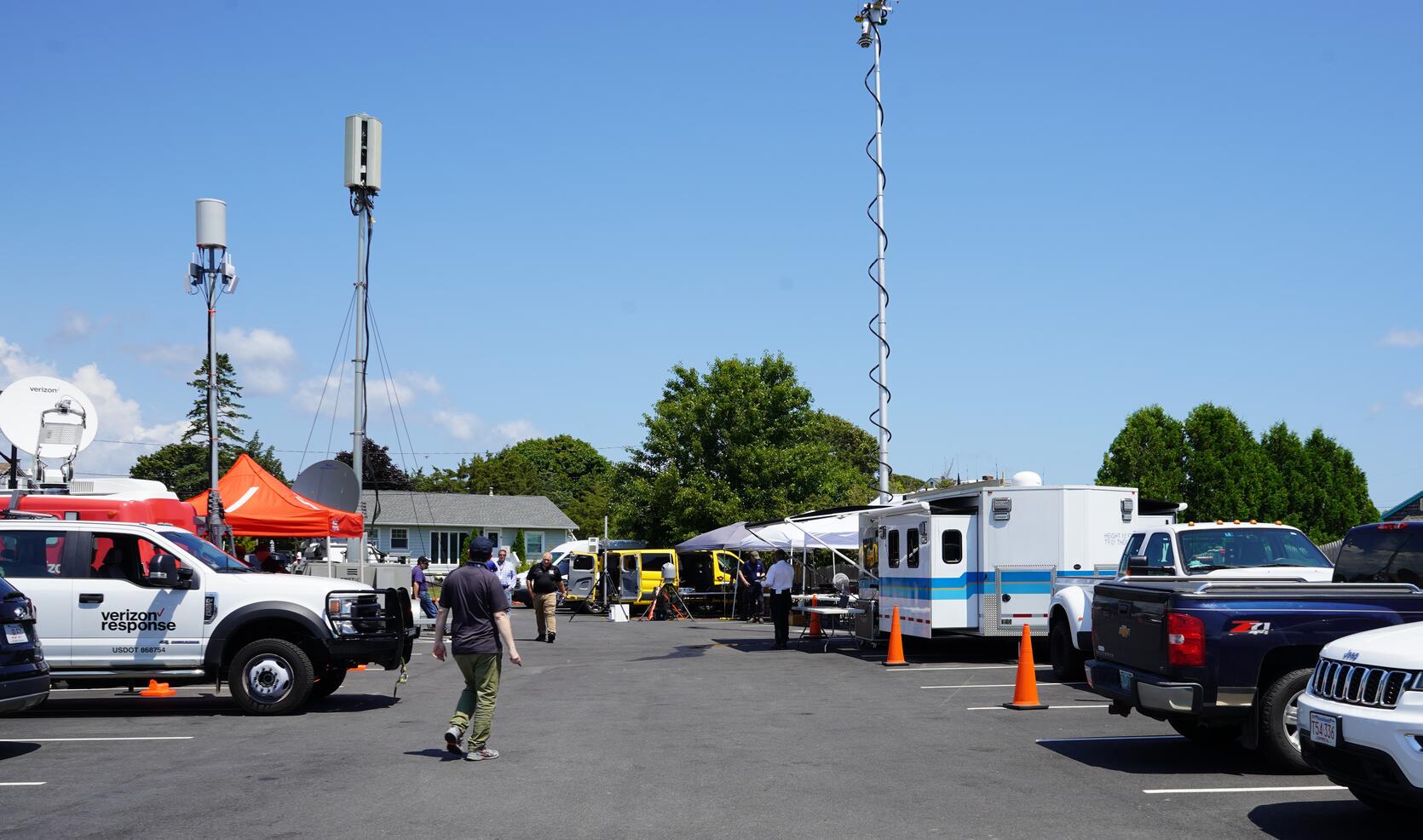 Parking lot with deployable disaster response resources on display.