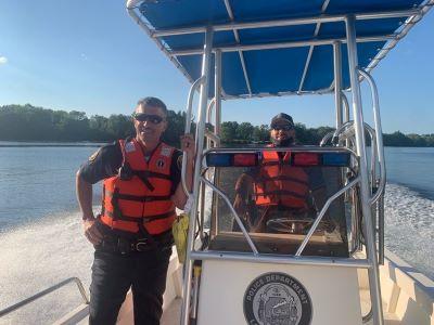Police officers on boat