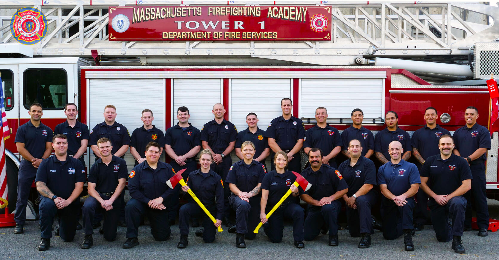 23 firefighters on and around a ladder truck